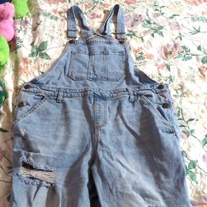 Distressed jean overalls